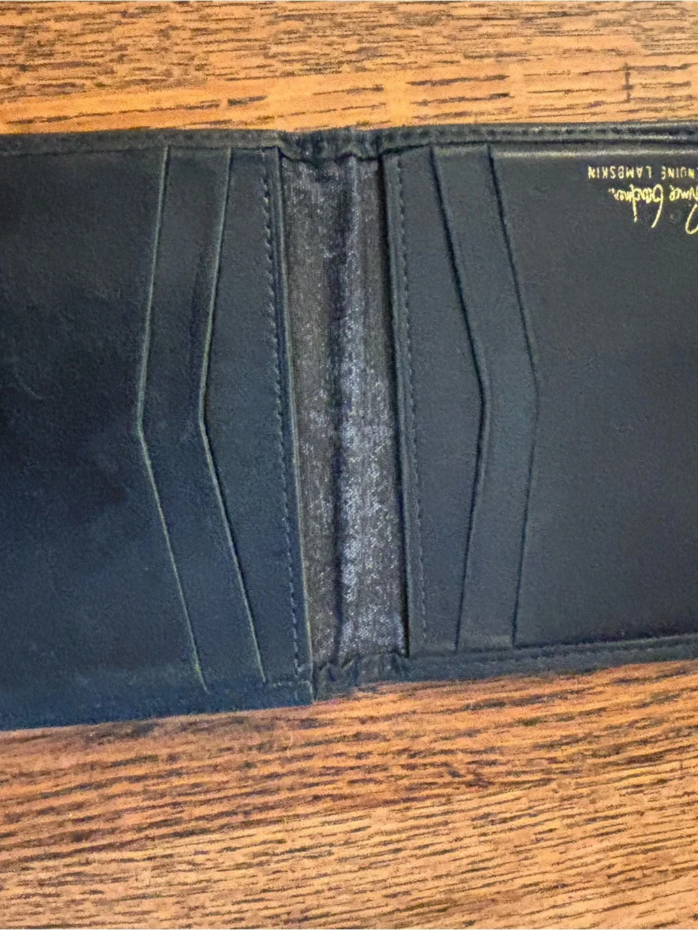 Four Vintage Black and Brown Leather Men's Wallets
